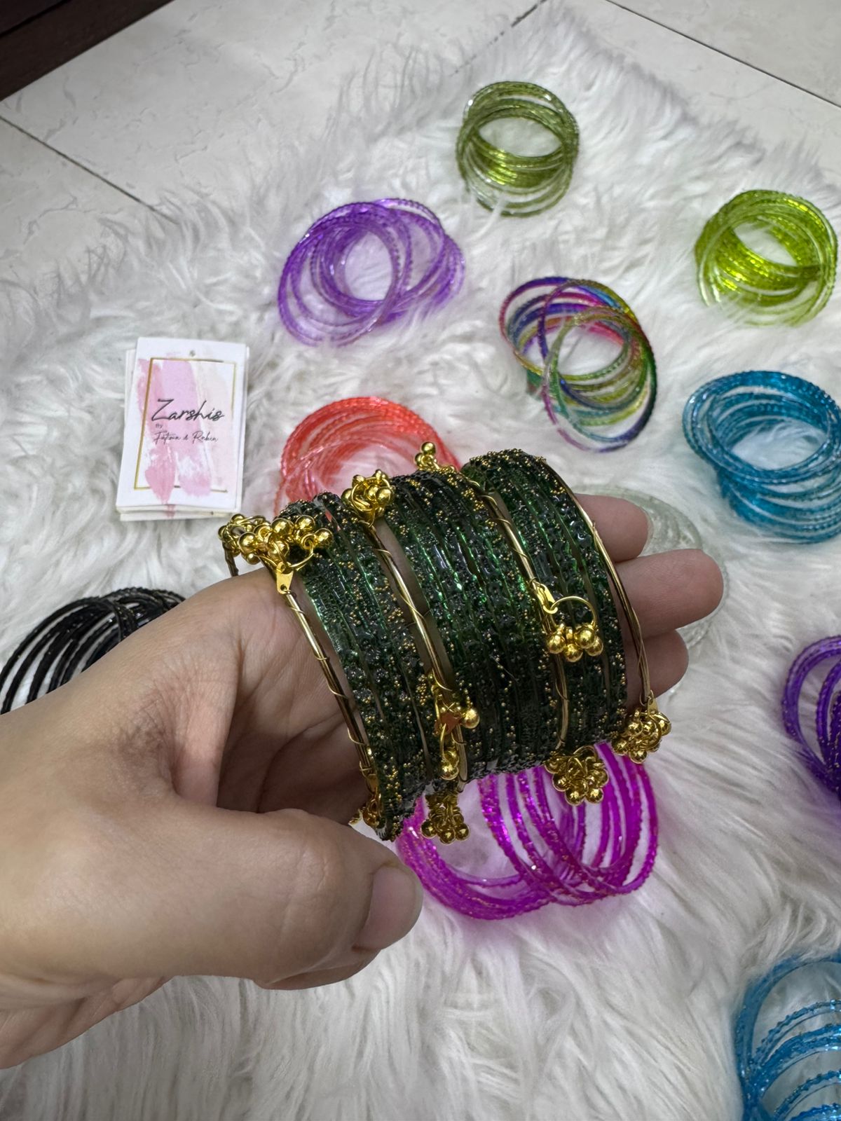Orignal pakistani raindrop bangles size 2.6
for details see below