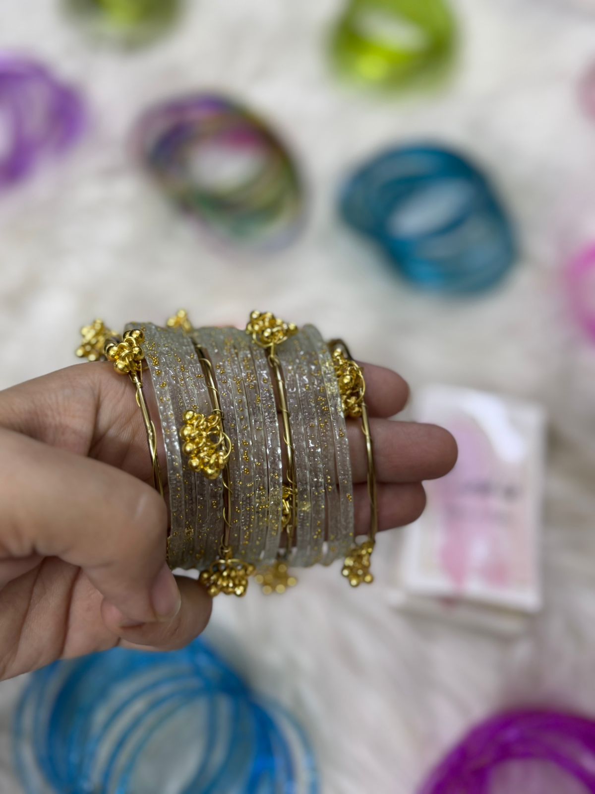 Orignal pakistani raindrop bangles size 2.6
for details see below
