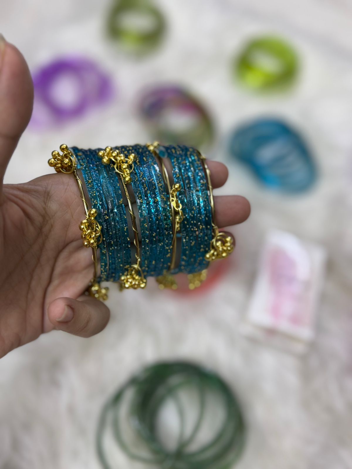 Orignal pakistani raindrop bangles size 2.6
for details see below