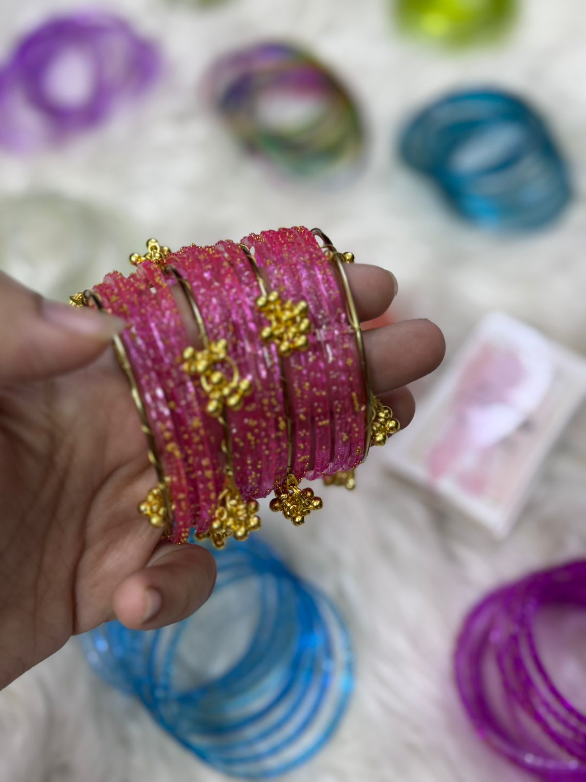 Orignal pakistani raindrop bangles size 2.6
for details see below
