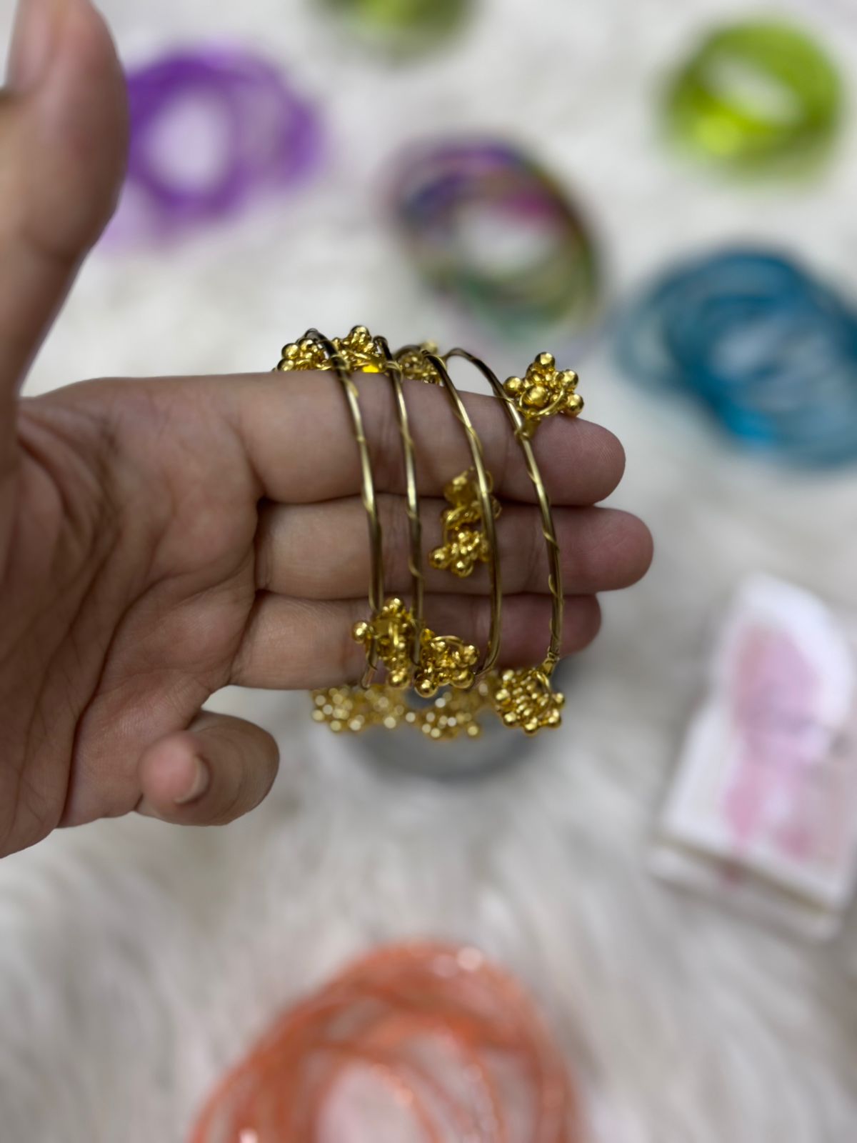 Orignal pakistani raindrop bangles size 2.6
for details see below