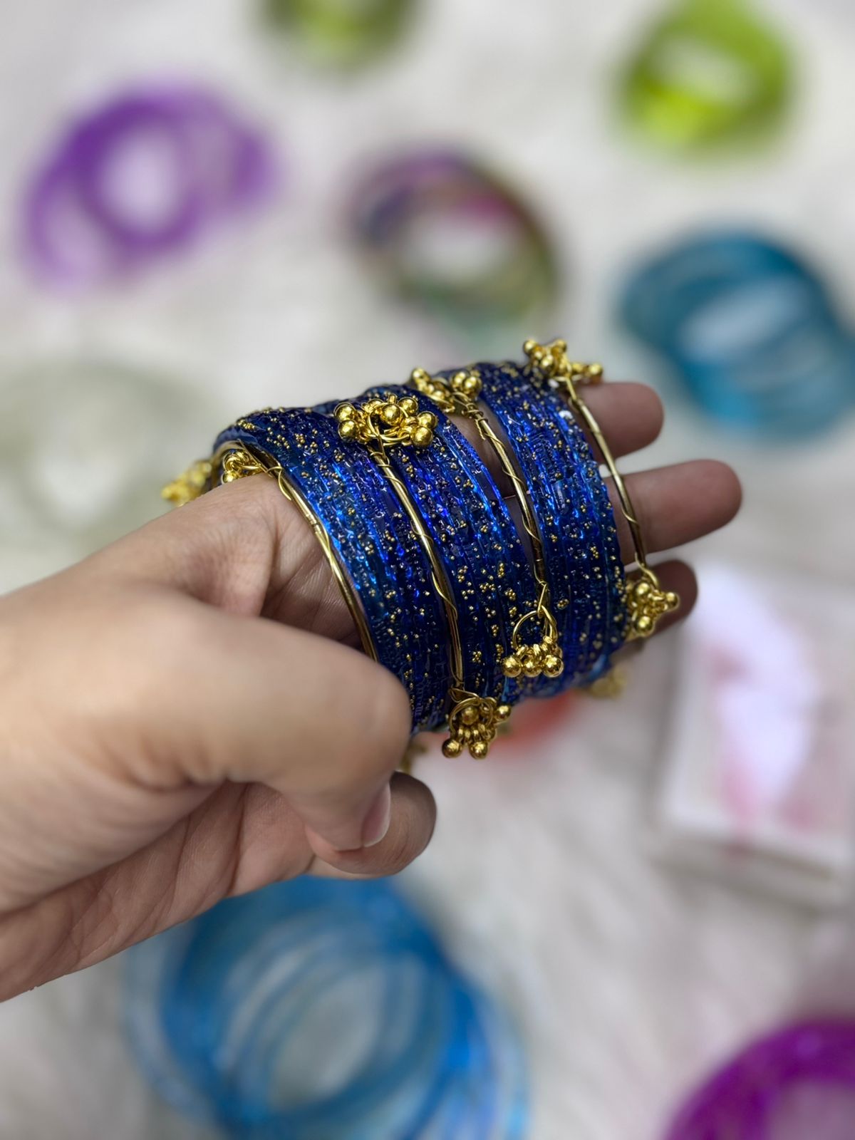 Orignal pakistani raindrop bangles size 2.6
for details see below
